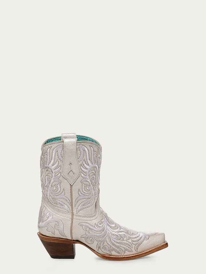 Side view of Corral Z5344 women’s bone ankle cowboy boot with white embroidered leather and snip toe, featuring 2-inch heel